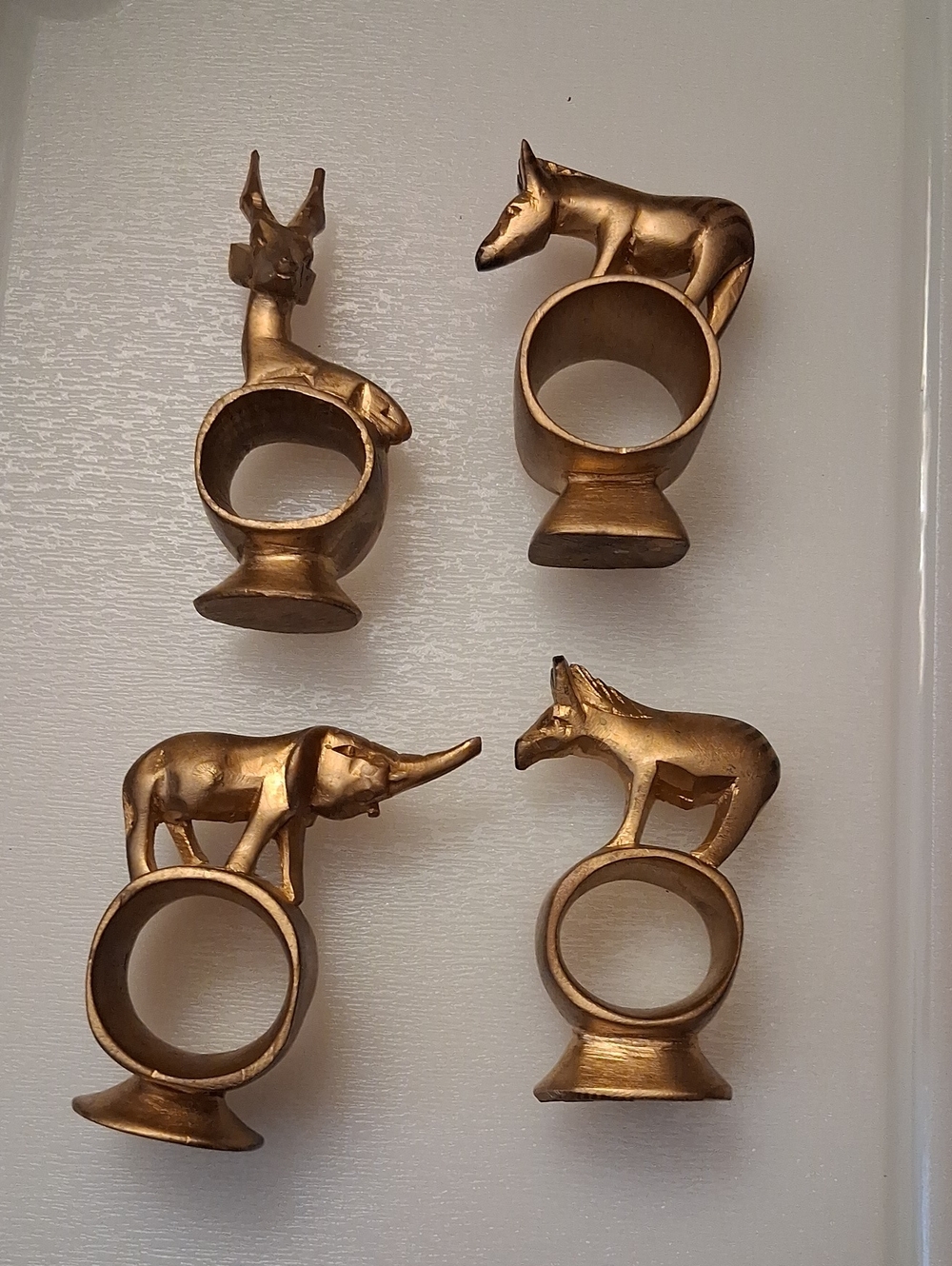 Vintage Set Of Four (4) Painted Gold African Animal Napkin Ring Set